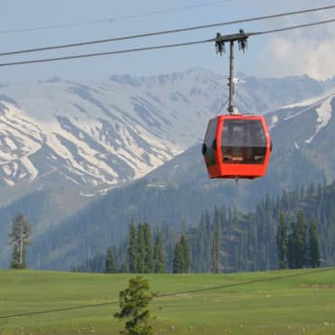 Gulmarg Gondola cabin above the valley meadows